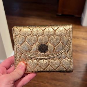 Beautiful gold betseyville by Betsey Johnson wallet with zipper compartment